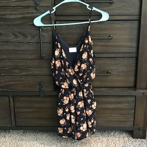 Navy and peach floral romper